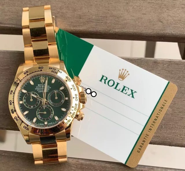 Rolex Oyster Perpetual Dourado Fundo Verde